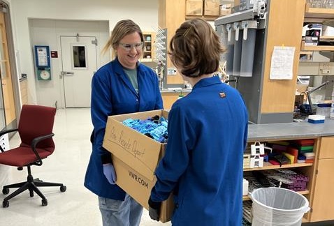 Two FSU Chemistry Ph.D. students– Kristen Weeks and Carley Reid–introduce a glove recycling program.